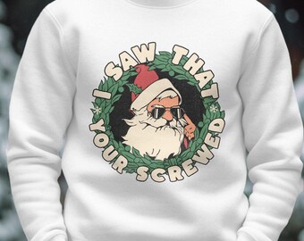 May include: White sweatshirt with a Christmas-themed graphic of Santa Claus wearing sunglasses and a wreath with the text "I saw that you screwed".