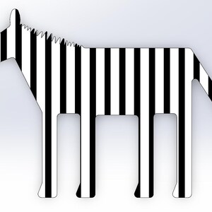 May include: A black and white striped zebra figure. The zebra has a simplified design with a saw-tooth mane and a rectangular body. The legs are rectangular, and the tail has a saw-tooth edge. The design is minimalist.