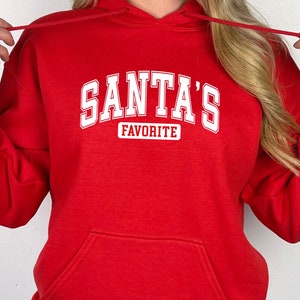 La sudadera navideña favorita de Papá Noel: un atuendo acogedor para las fiestas