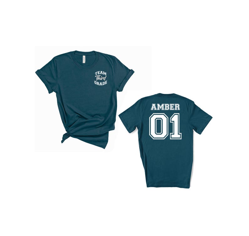 May include: Two teal t-shirts. One has "Team Third Grade" printed on the front. The other has "Amber 01" printed on the back. The shirts are short-sleeved and made of a soft material.