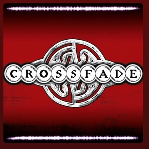 May include: A silver logo with the word "CROSSFADE" in black letters on a red background. The logo is surrounded by a Celtic knot design.