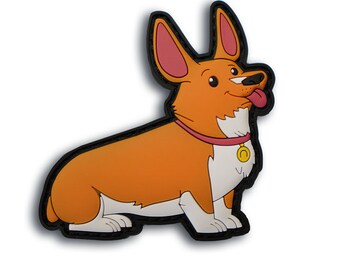 May include: A cartoon-style patch featuring a corgi dog in a sitting position. The dog has orange fur, white chest and paws, and a pink collar with a gold pendant. The patch has a black border and a white background.
