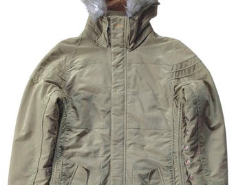 May include: A green hooded jacket with a faux fur trim around the hood. The jacket has a zipper closure and multiple pockets.