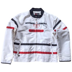 May include: White jacket with black and red stripes. The jacket has a zipper closure and a stand-up collar. The front of the jacket features the text "REVENGE of the TUNDRA" in red and black lettering.