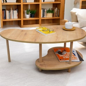 Bean Shape Coffee Table with Wooden Legs and Two Shelves – Magazine Rack & Newspaper Holder