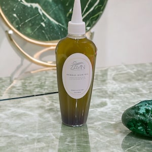 HERBAL INFUSED OIL - Power packed with over 30 herbs and oils