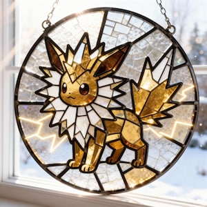 May include: A stained glass window featuring a golden and white cartoon character with large ears and a spiky tail. The round window is framed in black and hangs from a chain. The background shows a snowy outdoor scene.