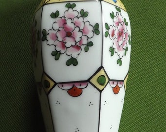 Rare and Magnificent Small Hexagonal Vase in Madesclaire de Limoges Porcelain with handmade floral decorations and gold edging.