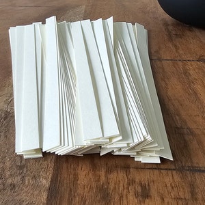 Confezione da 100 strisce di carta cotone, 8 x 220 mm, Fedrigoni Materica Limestone, 250g/m2
