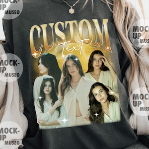 May include: Dark gray sweatshirt with a gold-colored "CUSTOM Text" design. The design includes multiple images of a woman. The sweatshirt is a mock-up from Museo.