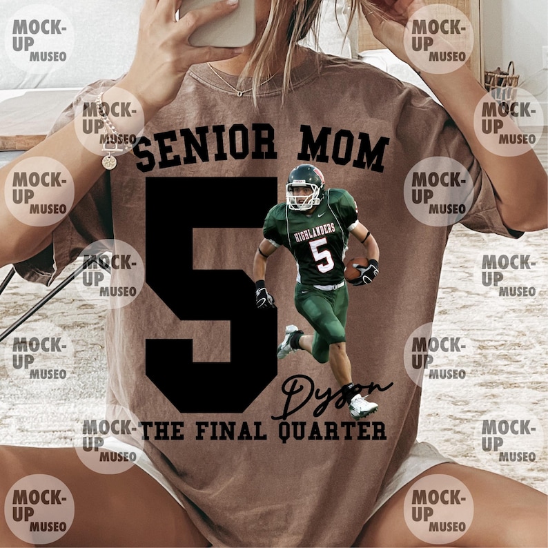 May include: A brown t-shirt with the text "SENIOR MOM" above a large black number 5. A football player in a green uniform is running with a football. The text "Dyson" and "MOCK-THE FINAL QUARTER" are also visible.