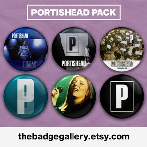 May include: Six round, colorful, pinback buttons featuring the band Portishead. The buttons feature the band's name, album covers, and the letter "P".