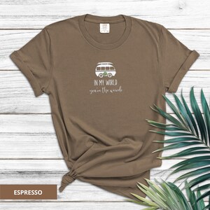 Comfort Colors embroidered shirt with VW camper van and “In My World You're the Weirdo” text in white thread