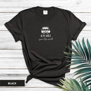 Comfort Colors embroidered shirt with VW camper van and “In My World You're the Weirdo” text in white thread