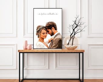 May include: A black and white wedding portrait of a couple with the text "Julia & Bastian" above them.