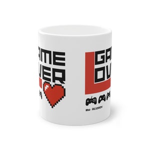 taza game lover taza unisex en mano de chico