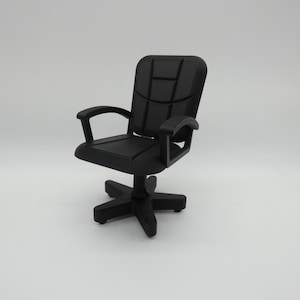 May include: A black office chair with a padded seat and back, a five-point star base, and black wheels.