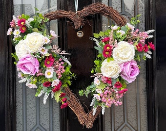 Handmade pink faux flower rattan heart wreath