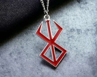 Berserk Mark Emblem Necklace – Guts’ Blade Pendant – Anime Cosplay Accessory – Chic Jewelry Charm – Unique Gift Idea for Fans