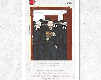 May include: Trading card featuring a central figure holding flowers, surrounded by individuals in black attire and balaclavas. The card has the text "PTK" at the top and German text at the bottom. A red hand gesture is in the upper left corner.