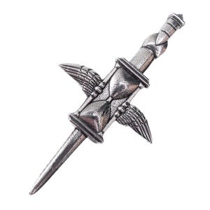 May include: A silver-colored dagger with an hourglass in the center and two sets of wings. The dagger has a pointed blade and a detailed handle. The hourglass is centered between the wings.