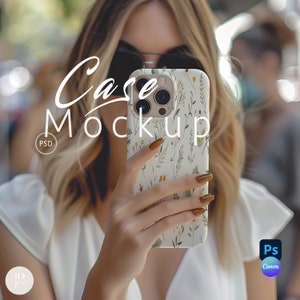 May include: A white phone case with a floral pattern and a gold camera lens. The case is being held by a person's hand. The text "Case Mockup" is written in white on a black background.