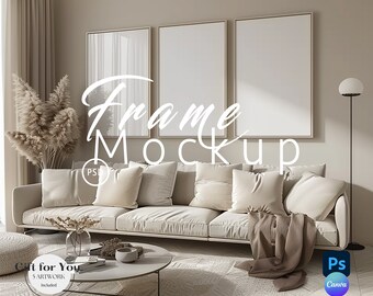 May include: A mockup of three empty picture frames hanging on a beige wall above a white couch with pillows and a throw blanket. The couch is in a living room with a beige rug, a coffee table, and a tall floor lamp.
