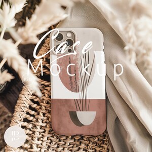 May include: A phone case mockup with a white background and a brown and white abstract design. The case has a cutout for the camera lens and a text overlay that says "Case Mockup".