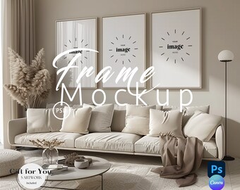 May include: A mockup of three picture frames in a living room setting. The frames are hanging on a light beige wall above a white couch with pillows and a throw blanket. A potted plant is on the left side of the couch and a floor lamp is on the right side. The text "Frame Mockup" is written in black on the wall.