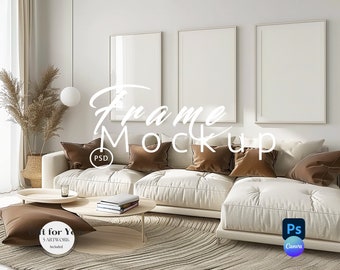 May include: A white sectional sofa with brown throw pillows in a living room setting with three white picture frames on the wall. The frames are empty and ready for your artwork.