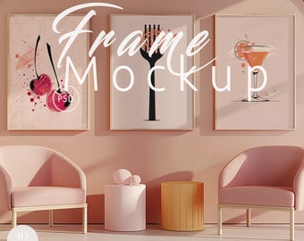 May include: Three framed art prints on a pink wall with two pink armchairs and two side tables. The art prints feature a cherry design, a fork with pasta, and a cocktail glass.