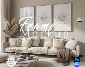 May include: A mockup of three framed prints in a living room setting. The frames are beige and the prints are white with a light brown circle in the center. The text "Your Image Here" is inside the circle. The frames are hanging on a beige wall above a white couch with beige pillows. There is a brown throw blanket on the couch. A small round table with a vase of dried flowers and a book is in front of the couch. The floor is beige with a white and beige patterned rug.