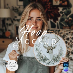May include: A circular embroidery hoop with a deer design surrounded by a floral wreath. The words "Hoop Mockup" are written across the top. The image also includes the text "Gift for You" and "I Mock Up Free".