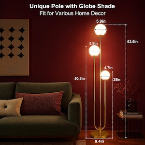 May include: A gold floor lamp with three vertical poles and three white spherical globe shades. The lamp stands 62.6 inches tall with a 9.4-inch base. The globes measure 5.9 inches and 4.7 inches in diameter, with heights of 50.8 and 38 inches.
