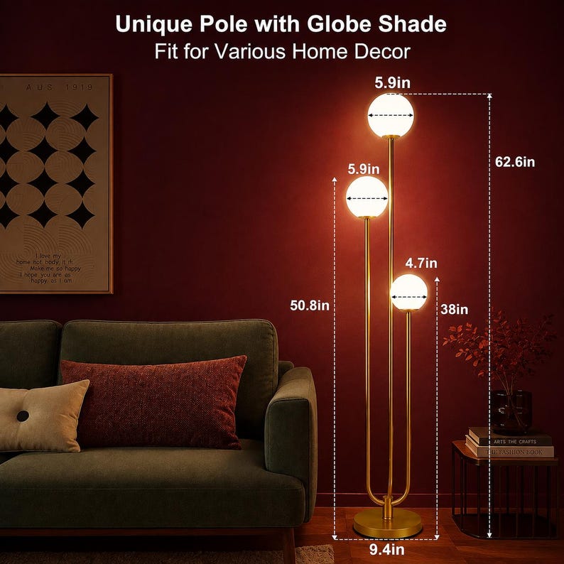 May include: A gold floor lamp with three vertical poles and three white spherical globe shades. The lamp stands 62.6 inches tall with a 9.4-inch base. The globes measure 5.9 inches and 4.7 inches in diameter, with heights of 50.8 and 38 inches.