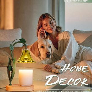 May include: A decorative candle holder with a wooden base, a white candle, and a green glass shade. The metal frame has a leaf design. The text "HOME DECOR" and "Add a decorative touch to any home" are visible.