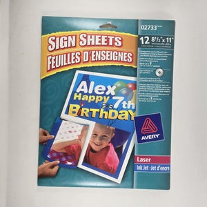 May include: A package of Avery sign sheets, 8.5 x 11 inches, with the text "Sign Sheets" and "Feuilles d'Enseignes". The package features a birthday card with the text "Alex Happy 7th Birthday".