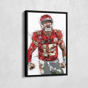 May include: Framed artwork of a football player in a red jersey with the number 15, a red helmet, and gray pants. The artwork has a watercolor effect, with splashes of color and a white background. The player is in an action pose.