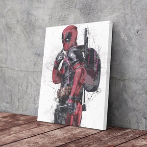 May include: A digital art print of Deadpool, a superhero character, in a red and black suit with a pink and black backpack. The background is white with black splatters of paint.