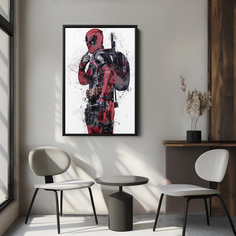 May include: A digital art print of Deadpool, a superhero character, in a red and black suit with a black and pink backpack. The background is white with splattered paint.