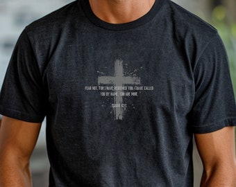 May include: A black t-shirt with a distressed white cross and the text "FEAR NOT, FOR I HAVE REDEEMED YOU. I HAVE CALLED YOU BY NAME. YOU ARE MINE. ISAIAH 43:1"