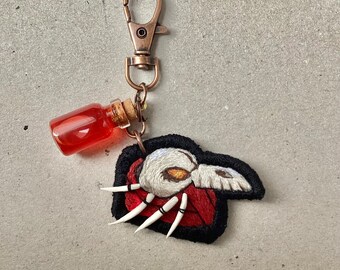 Pathologic Executor Hand Embroidery Keychain