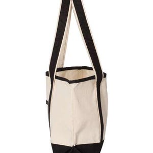 May include: A cream-coloured canvas tote bag with black detailing. The bag has black trim and straps. The design is simple and classic, suitable for carrying various items. The bag's dimensions are approximately 30 cm wide and 35 cm high.