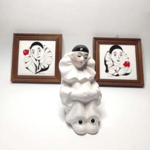Set of 2 ceramic Pierrot Harlequin figures in wooden frames, France, 1970s, 13x13x1.2 cm, and 1 ceramic Pierrot figure, 1980s, Toronto, 13 cm