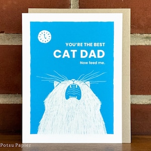 Funny blue greeting card of illustrated cat meowing loudly with a clock showing 5am.

Message: You're the best cat dad. Now feed me.

Includes a2 kraft envelope.