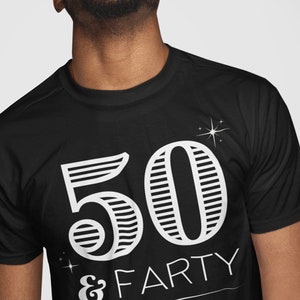 May include: A black t-shirt with a white graphic design that says "50 & FARTY". The number 50 is in a bold, striped font. The person wearing the shirt is laughing.