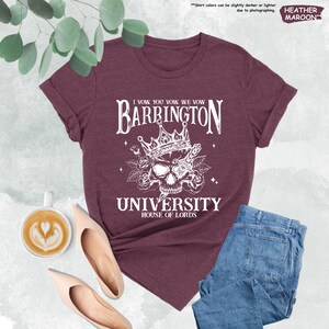 a t - shirt with a skull on it and a cup of coffee next to