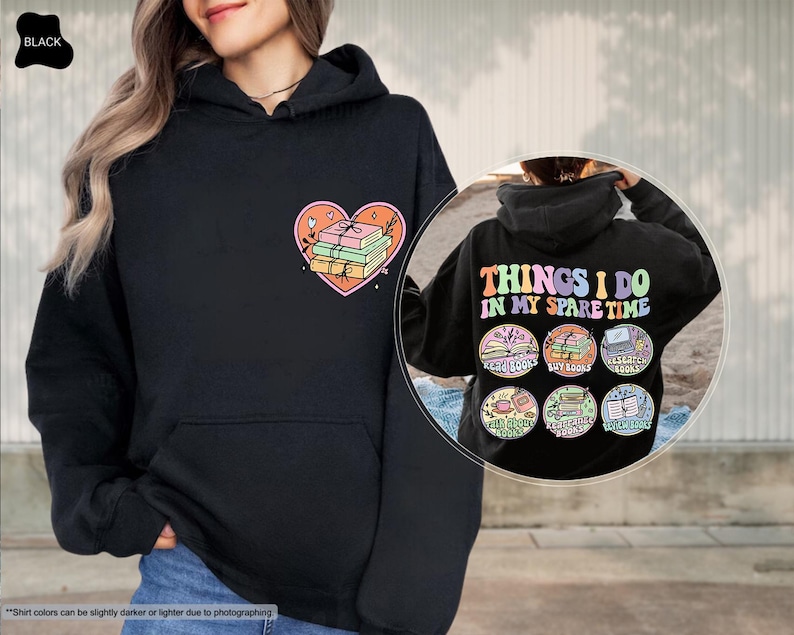 a woman wearing a black hoodie with the words things i do in my spare