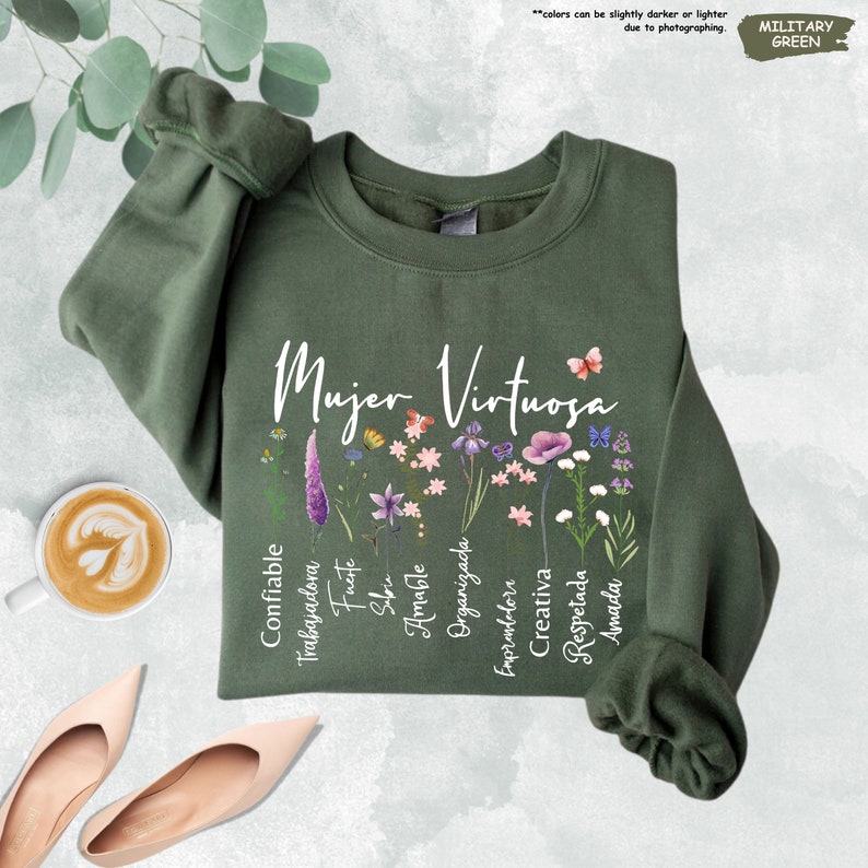 a green shirt with flowers and a cup of coffee