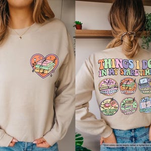 a woman wearing a sweatshirt that says things i do in my spare time